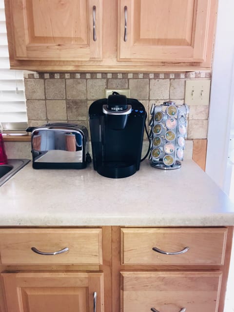 Fridge, microwave, stovetop, coffee/tea maker