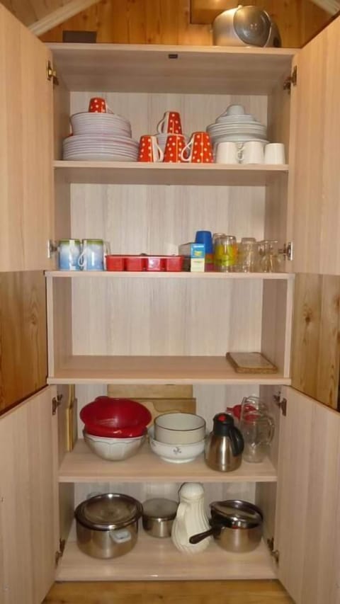 Fridge, stovetop, coffee/tea maker, cookware/dishes/utensils