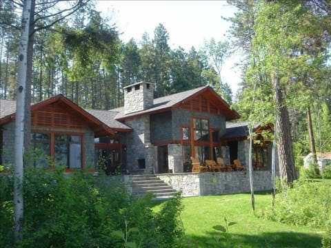 Lake side of custom craftsman home, 50' from the shores of lovely Flathead Lake.