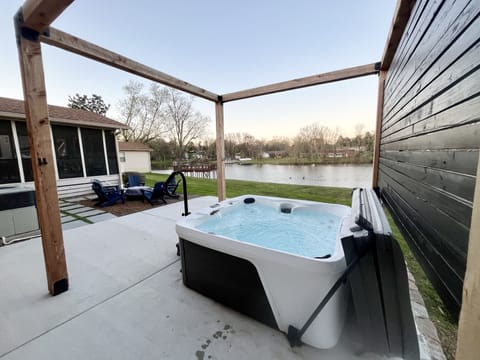 Relax in the hot tub while looking out over Old Hickory Lake