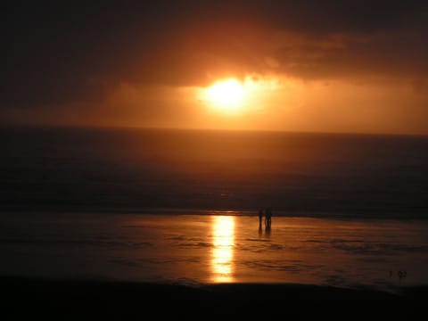 On the beach, sun loungers, beach towels