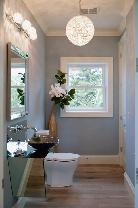 Prettiest powder room on the main floor for convenience