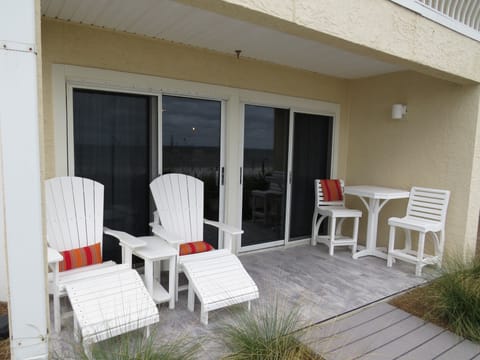 Relax with a coffee or beverage watching the waves in this waterfront condo