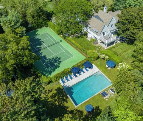 Aerial view of Tennis/Basketball, Pool, and Main house