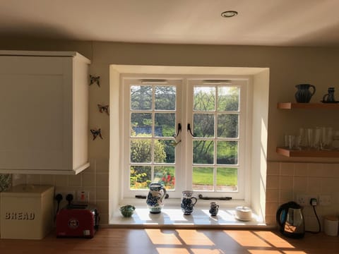 The kitchen overlooks the garden of the main farmhouse