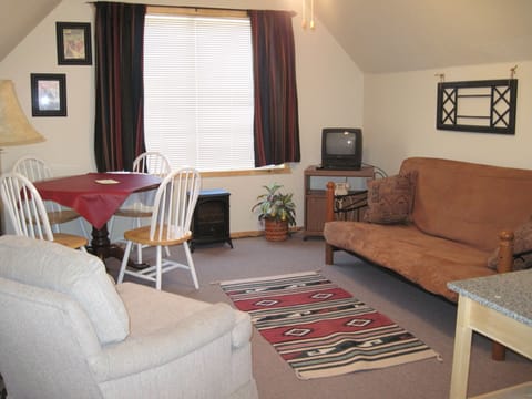 4th Bedroom, studio apartment over garage w/full size bed and half bath.