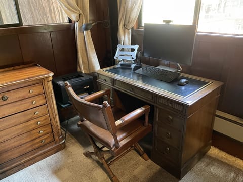 Office set up in the front bedroom.