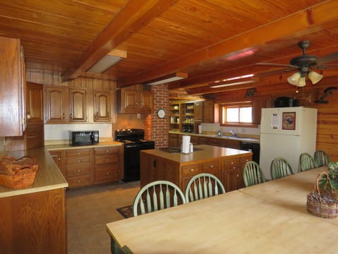 Kitchen/Dining area large enough for yet another gathering area.