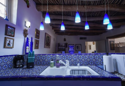 Casita Azul welcomes you as you enter and are greeted with blue tile.
