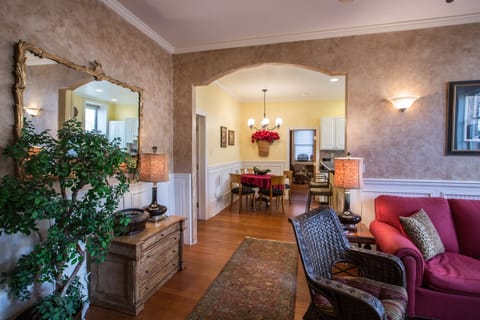 Huge, bright living space opens into dining area, kitchen and then bedroom.