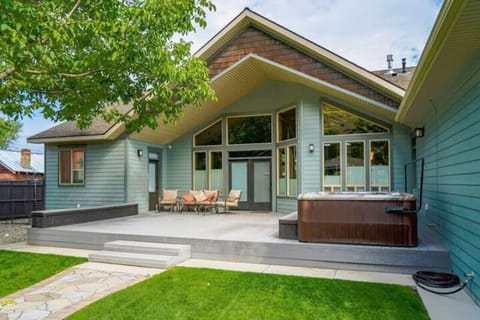 Back patio with hot tub**Private and not a shared space with The Cottage on the property**