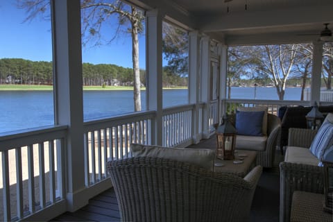 Screened Porch Offers Panoramic Lake and Golf Views