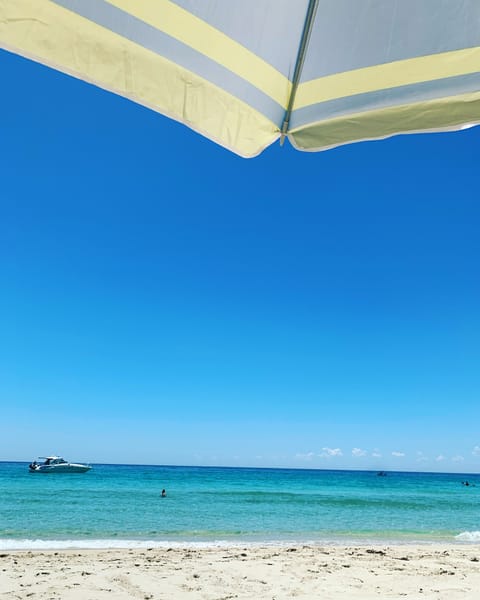 On the beach, sun loungers