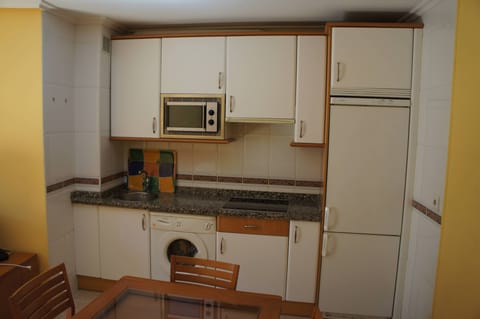 Fridge, microwave, dining tables