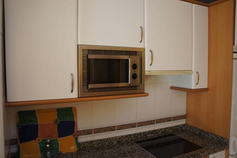 Fridge, microwave, dining tables