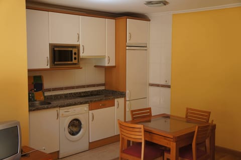 Fridge, microwave, dining tables