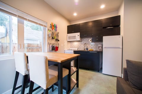 Kitchen, note large sunny window (has a blind for privacy)