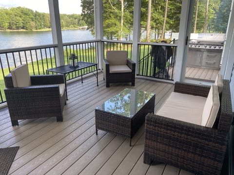 Screen porch off kitchen.  Gas grill on outside deck.