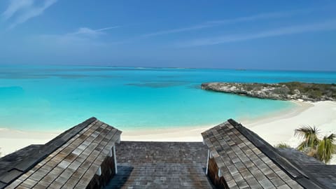 On the beach, sun loungers, beach towels