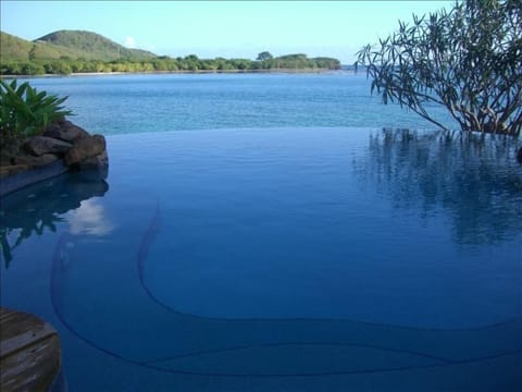 Breathless infinity pool with jacuzzi jets and waterfall!