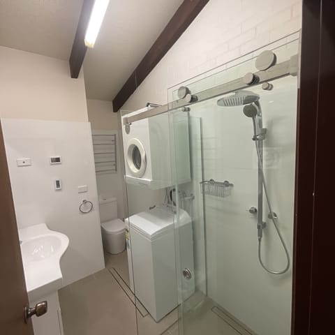 Shower, hair dryer, heated floors, towels