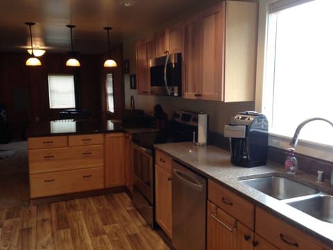 Fully equipped downstairs kitchen with all the essentials. 
