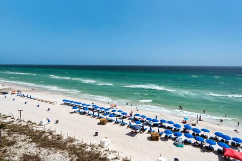 On the beach, sun loungers, beach towels