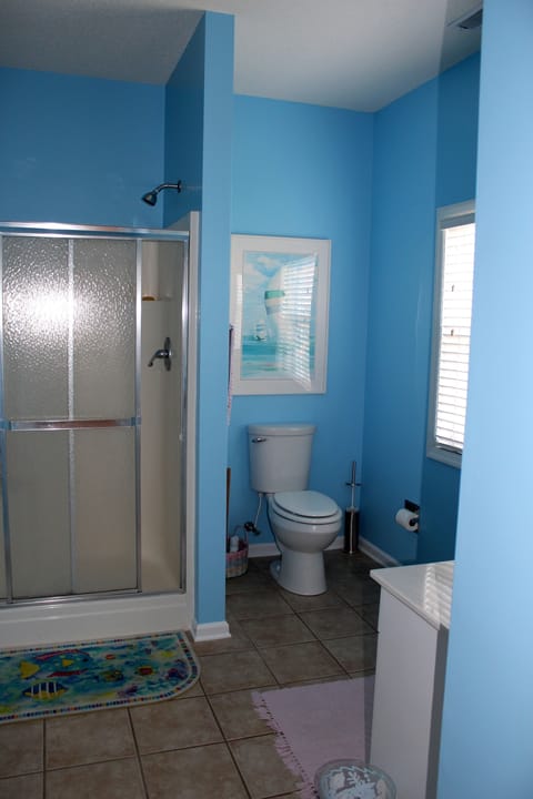 Full bath, 3rd level - connects to bedroom & also has a door to living area.