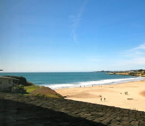 On the beach, sun loungers, beach towels