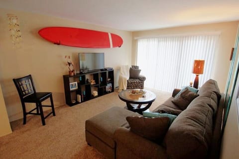 Spacious Living Room with Custom Surf Board