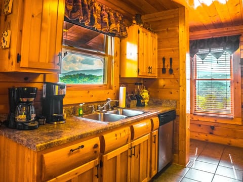 Fully stocked with a coffee maker, keurig, and mountain views while you cook
