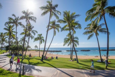 On the beach, sun loungers, beach towels