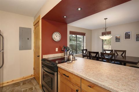 Full kitchen with oven, stovetop, fully stocked pots, pans, co and pantry.
