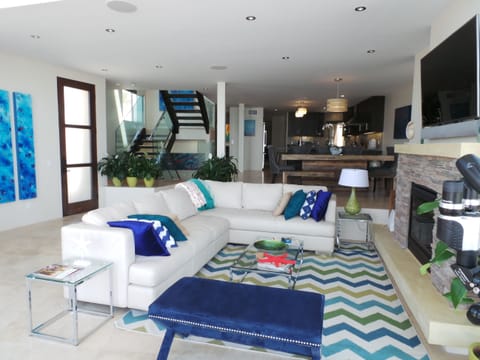 Contemporary living room with seating for all guests.