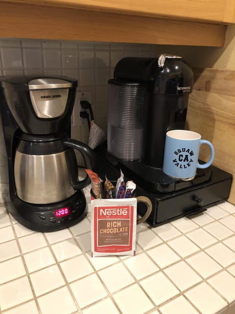 Nespresso maker and a regular coffee maker.