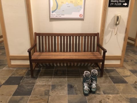 Bench outside our door to change in or out of boots. Walk out the door to lifts