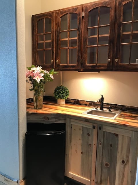 Lower wet bar with mini fridge