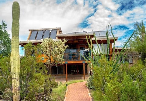 Solar home with elevated deck-view from patio.