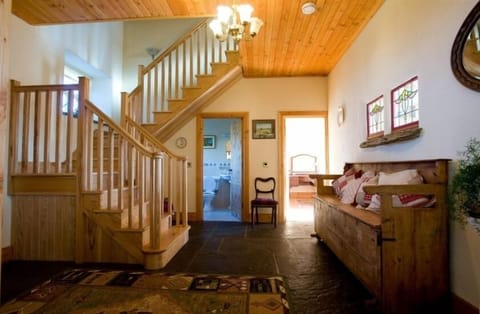 Hallway with old settle bed
