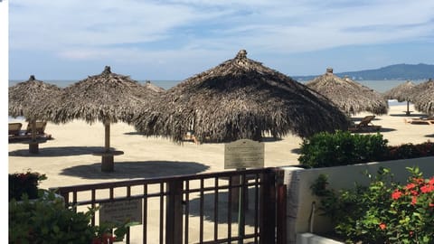 On the beach, sun loungers, beach towels