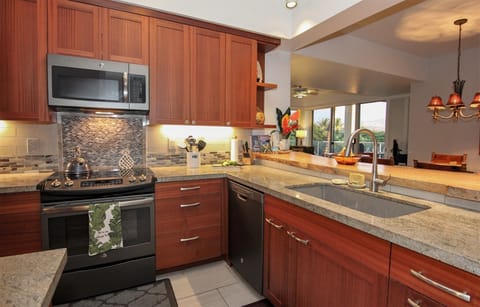 Fully equipped gourmet kitchen with high end appliances. 