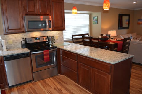 Bright and airy, the kitchen is a wonderful place to plan your day.