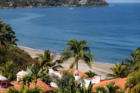 On the beach, sun loungers, beach towels