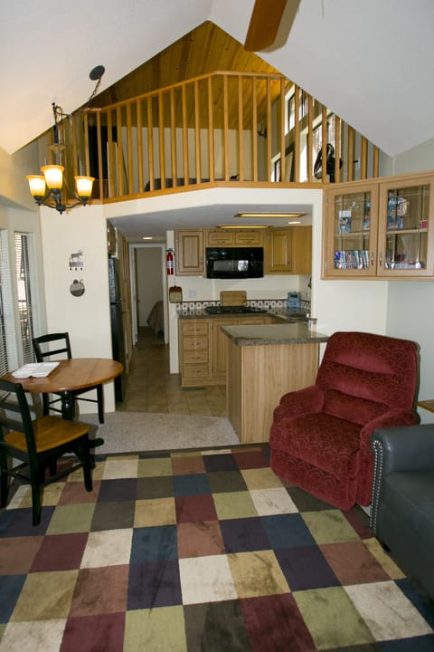 Cabin 1. Upstairs has a queen bed and 8 foot ceilings.