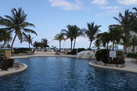 A heated pool, pool umbrellas, sun loungers
