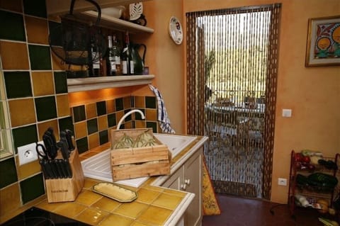 Kitchen, door to veranda