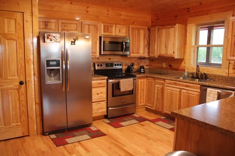 Huge open kitchen with new stainless appliances