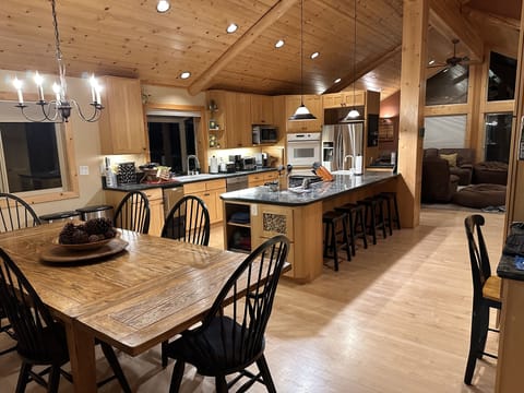 Kitchen, Dining Room Table, Breakfast bar for 4, more chairs are in closet. 