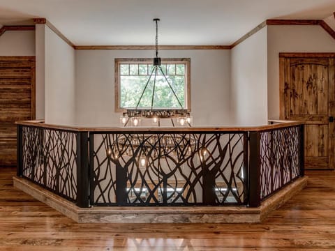 Upper balcony view with custom iron railing
