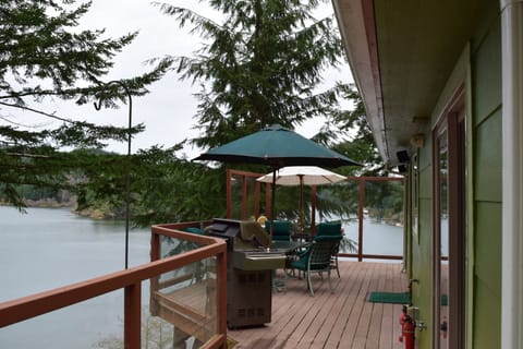 A glimpse of the view. Seating for 10 on the main deck. Propane grill.